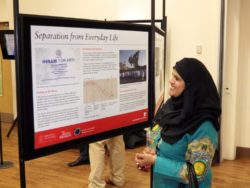 Visitor to Dr McLoughlin's talk and poster exhibition at the Muslim Women's Council, Bradford, September 2014.