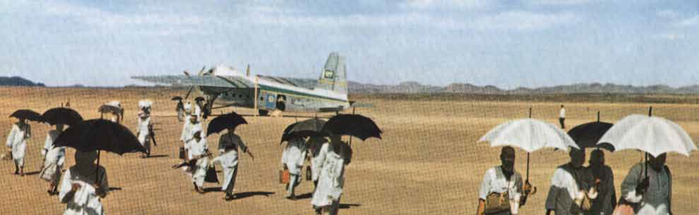 Pilgrims disembarking from a plane, Abdul Ghafur Sheikh, 1953.